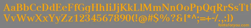 フォントCompatilTextLtComBold – オレンジの文字は灰色の背景にあります。