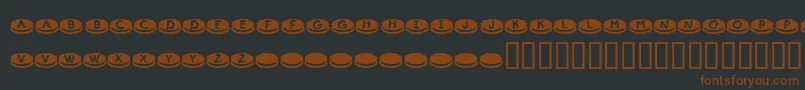 KrDunkers Font – Brown Fonts on Black Background
