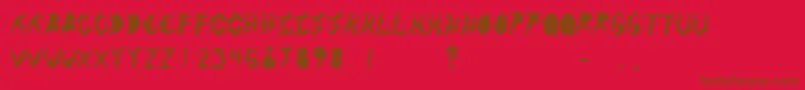 KeneelMessy Font – Brown Fonts on Red Background