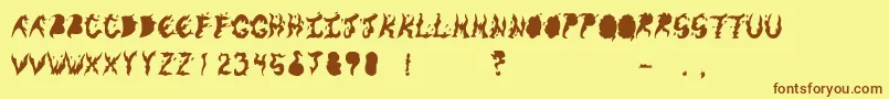 KeneelMessy Font – Brown Fonts on Yellow Background
