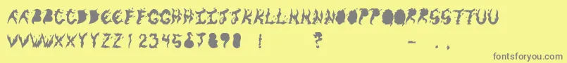 KeneelMessy Font – Gray Fonts on Yellow Background