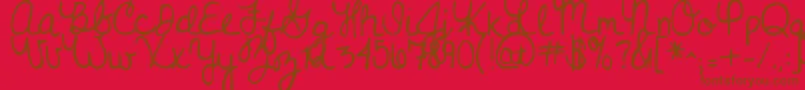 Nevergrowup Font – Brown Fonts on Red Background