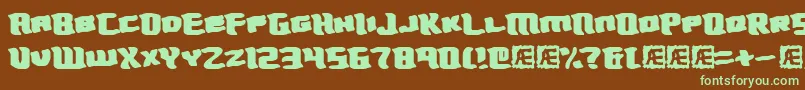 Turmoil Font – Green Fonts on Brown Background