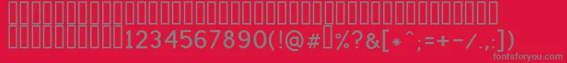 フォントLatha – 赤い背景に灰色の文字