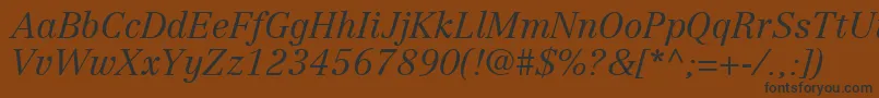 Шрифт CenturyRepriseLightSsiLightItalic – чёрные шрифты на коричневом фоне