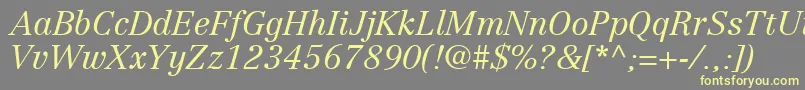 Шрифт CenturyRepriseLightSsiLightItalic – жёлтые шрифты на сером фоне