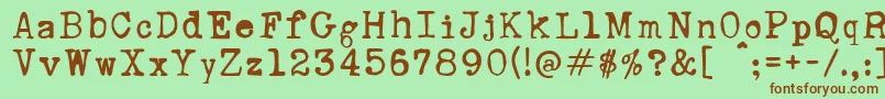 RustyTypewriter Font – Brown Fonts on Green Background