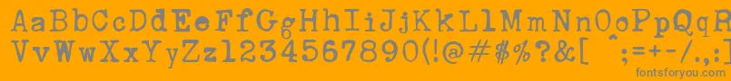 RustyTypewriter Font – Gray Fonts on Orange Background