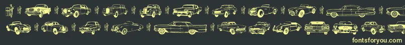 フォントOldcar – 黒い背景に黄色の文字