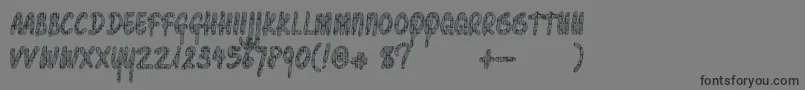 フォントPawnshoppretty – 黒い文字の灰色の背景