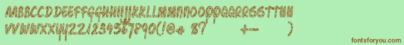Шрифт Pawnshoppretty – коричневые шрифты на зелёном фоне