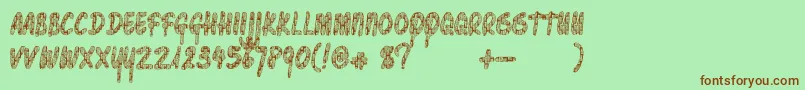 Pawnshoppretty Font – Brown Fonts on Green Background