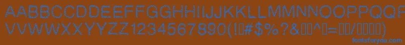 Gaelle2002 Font – Blue Fonts on Brown Background