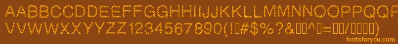 Gaelle2002 Font – Orange Fonts on Brown Background