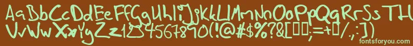 Inhishan-fontti – vihreät fontit ruskealla taustalla