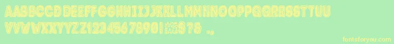 Trolli Font – Yellow Fonts on Green Background