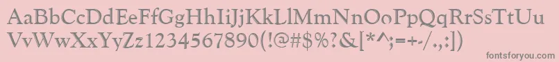 Goudyhand-fontti – harmaat kirjasimet vaaleanpunaisella taustalla