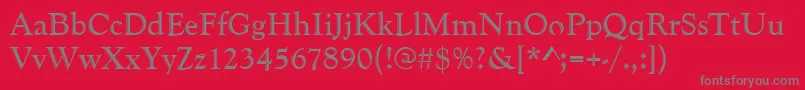 Goudyhand-fontti – harmaat kirjasimet punaisella taustalla