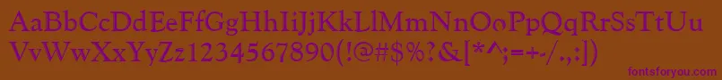 Goudyhand-fontti – violetit fontit ruskealla taustalla