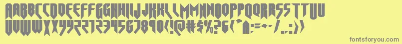 Opusmagnusexpand-fontti – harmaat kirjasimet keltaisella taustalla