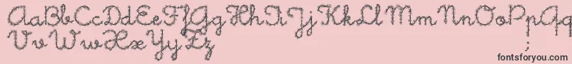 フォントLittleDaisy – ピンクの背景に黒い文字