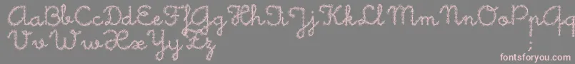 フォントLittleDaisy – 灰色の背景にピンクのフォント