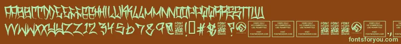 フォントTraviscountyRegular – 緑色の文字が茶色の背景にあります。