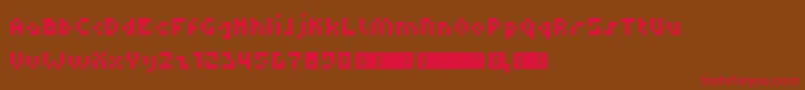フォントDupix – 赤い文字が茶色の背景にあります。