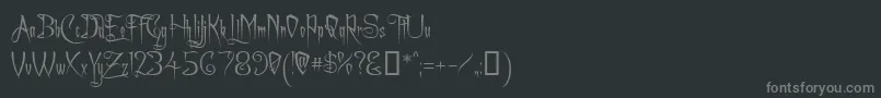 フォントCharmingFont – 黒い背景に灰色の文字