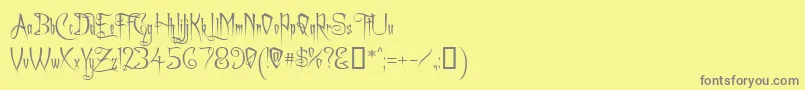 フォントCharmingFont – 黄色の背景に灰色の文字