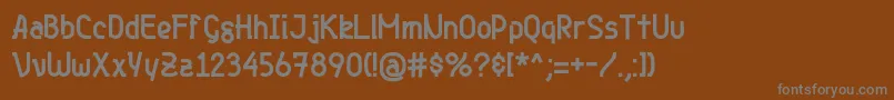 Шрифт Genjibold – серые шрифты на коричневом фоне