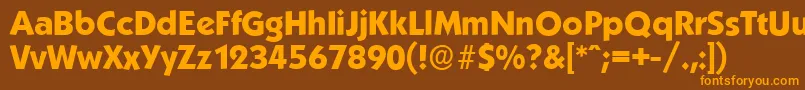 フォントKoblenzserialXboldRegular – オレンジ色の文字が茶色の背景にあります。