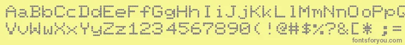 フォントFillit – 黄色の背景に灰色の文字