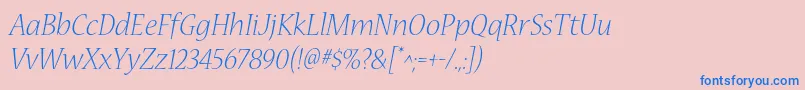 フォントNuevastdLightitalic – ピンクの背景に青い文字