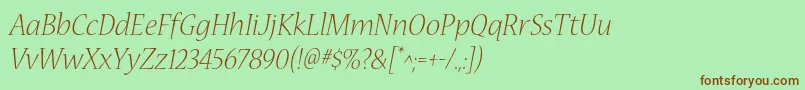 フォントNuevastdLightitalic – 緑の背景に茶色のフォント