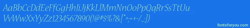 フォントNuevastdLightitalic – 青い背景に緑のフォント