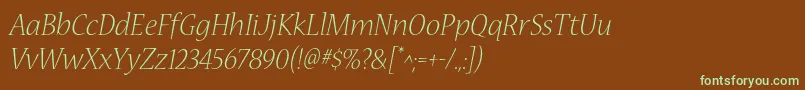 フォントNuevastdLightitalic – 緑色の文字が茶色の背景にあります。
