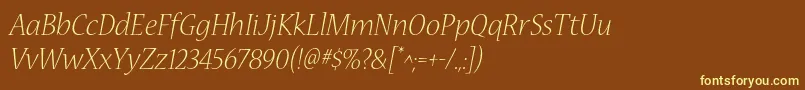 NuevastdLightitalic-fontti – keltaiset fontit ruskealla taustalla