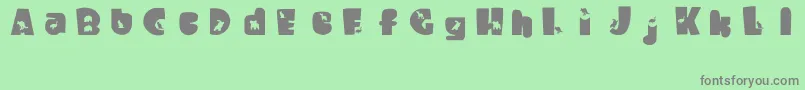 WaltzingMatilda Font – Gray Fonts on Green Background
