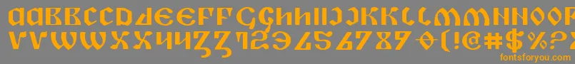 フォントPipere – オレンジの文字は灰色の背景にあります。