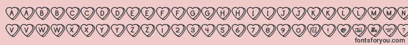 Fonte SweetHeartsTt – fontes pretas em um fundo rosa