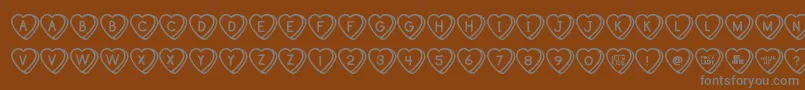 SweetHeartsTt Font – Gray Fonts on Brown Background