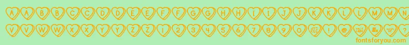 フォントSweetHeartsTt – オレンジの文字が緑の背景にあります。