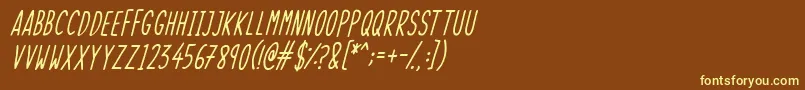 SkinnyThingsItalic-fontti – keltaiset fontit ruskealla taustalla