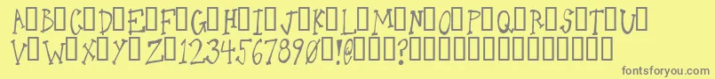 フォントOneLeggedDonkey – 黄色の背景に灰色の文字