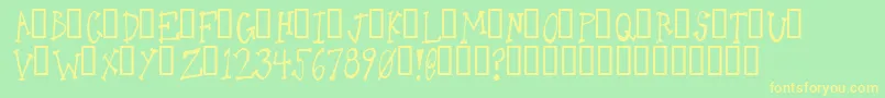 フォントOneLeggedDonkey – 黄色の文字が緑の背景にあります