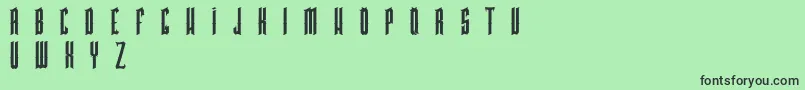 Czcionka PkHigmonum – czarne czcionki na zielonym tle