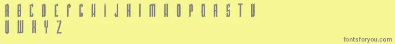 フォントPkHigmonum – 黄色の背景に灰色の文字