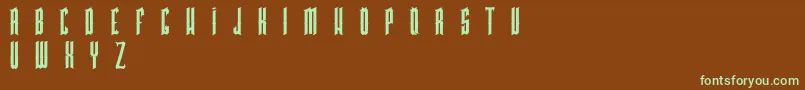 PkHigmonum-fontti – vihreät fontit ruskealla taustalla