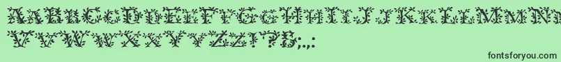 Ivydisplaycaps Font – Black Fonts on Green Background